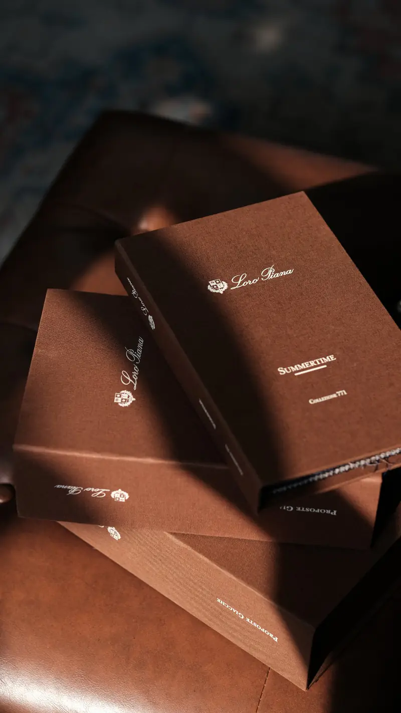 Loro Piana cloth bunches in brown covers